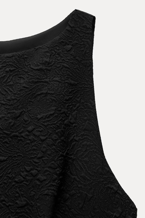 Vestido corto negro globo